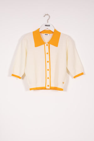 VOIR LE CARDIGAN BLANC CASSÉ